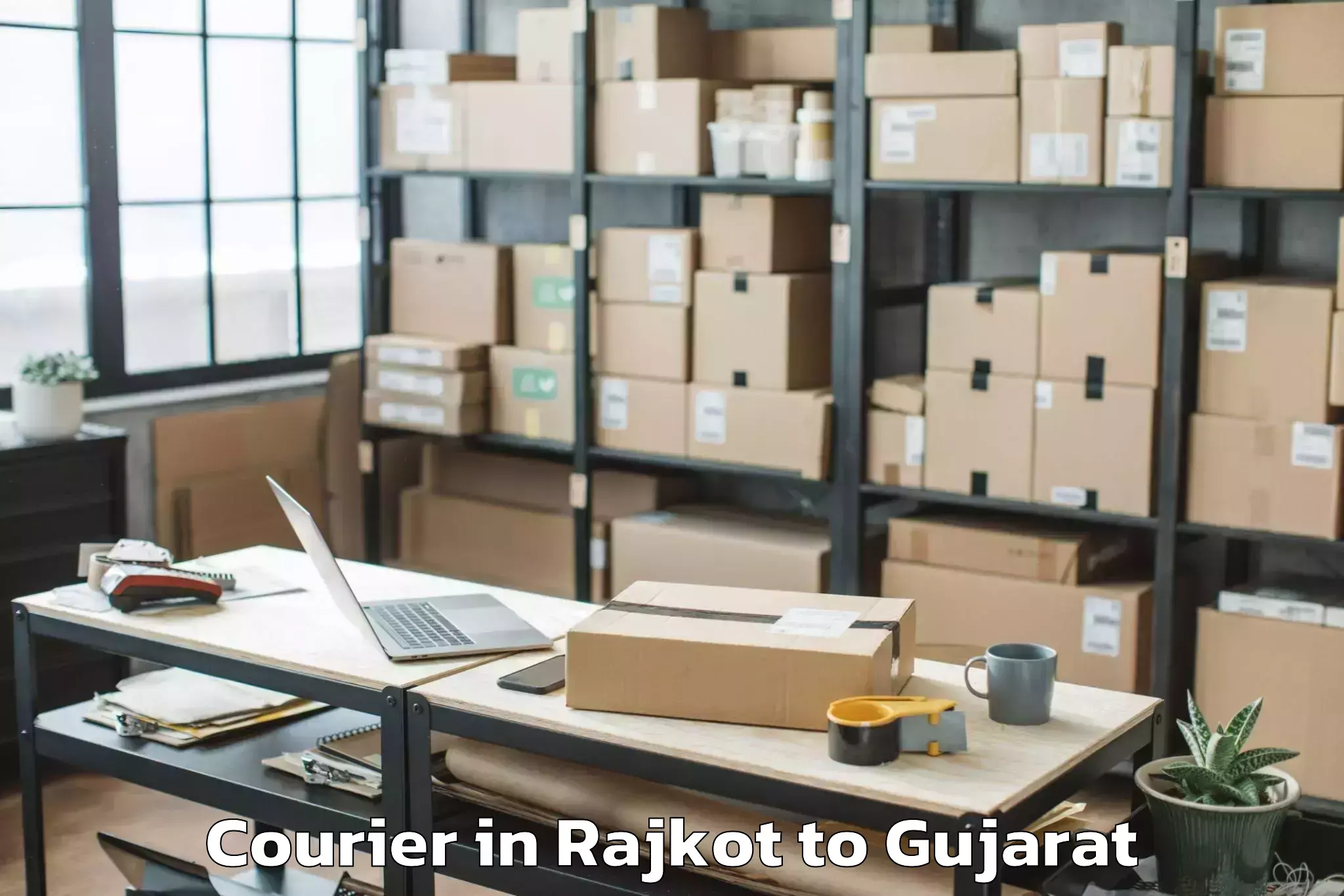 Get Rajkot to Dantiwada Courier